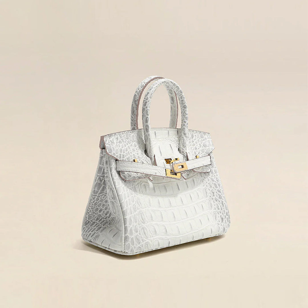 Platinum-Tasche aus Leder mit Kroko-Prägung und goldfarbenem Drehverschluss