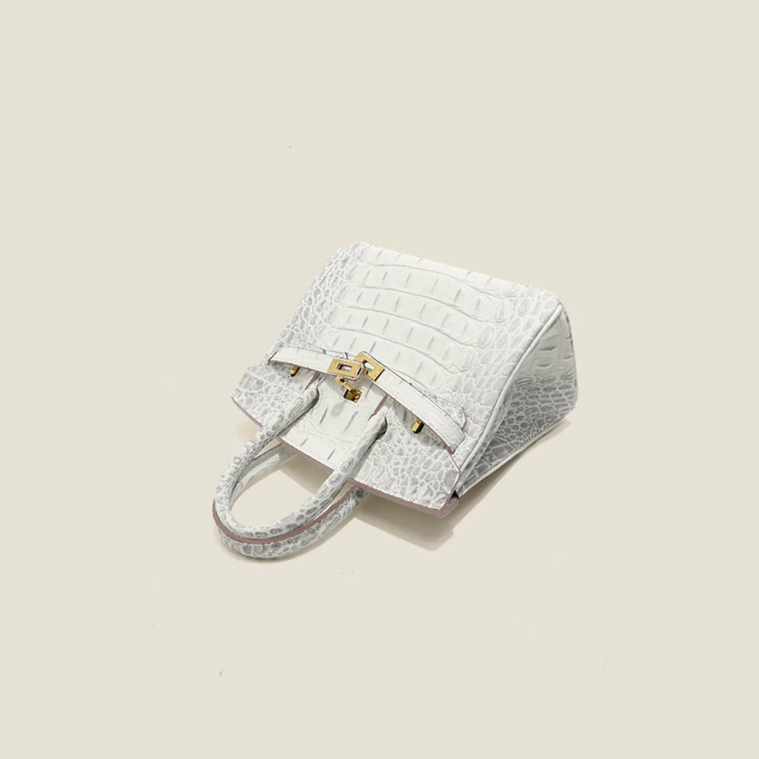 Platinum-Tasche aus Leder mit Kroko-Prägung und goldfarbenem Drehverschluss
