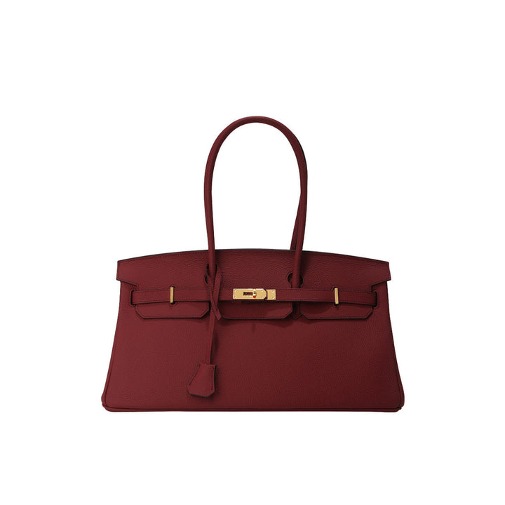 Birk-Schultertasche aus Narbenleder mit Henkeln und goldenen Beschlägen