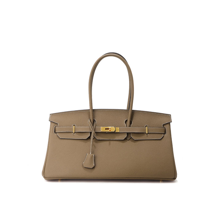 Birk-Schultertasche aus Narbenleder mit Henkeln und goldenen Beschlägen