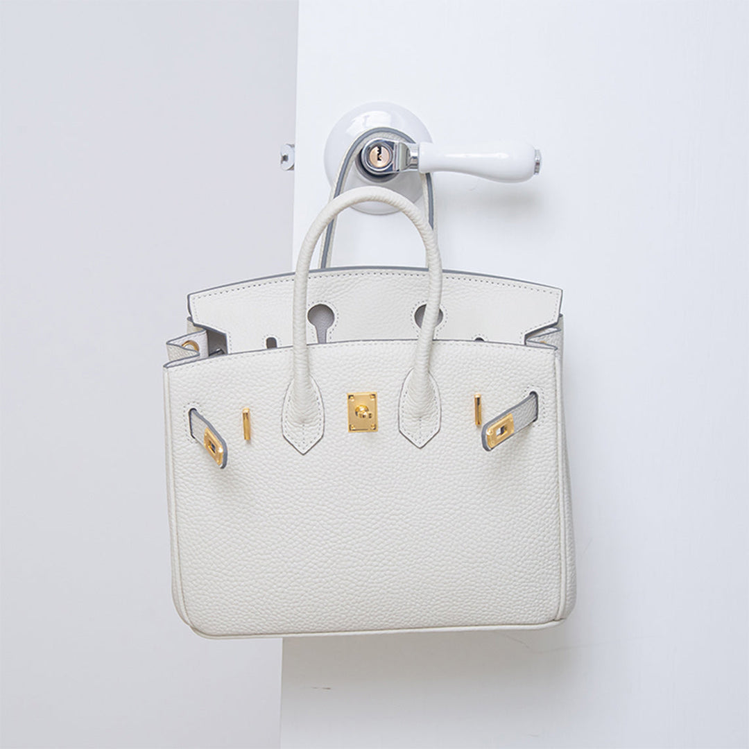 Birk-Handtasche aus Narbenleder mit goldenen Beschlägen