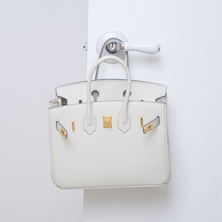 Birk-Handtasche aus Narbenleder mit goldenen Beschlägen