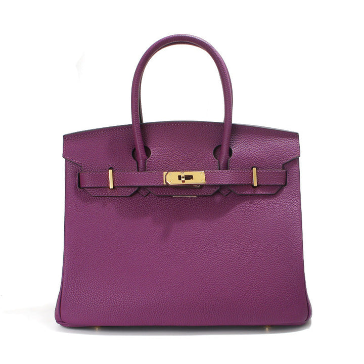 Birk-Handtasche aus Narbenleder mit goldenen Beschlägen
