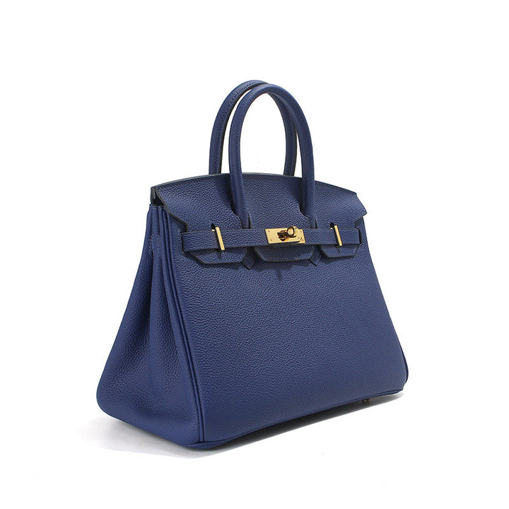 Birk-Handtasche aus Narbenleder mit goldenen Beschlägen