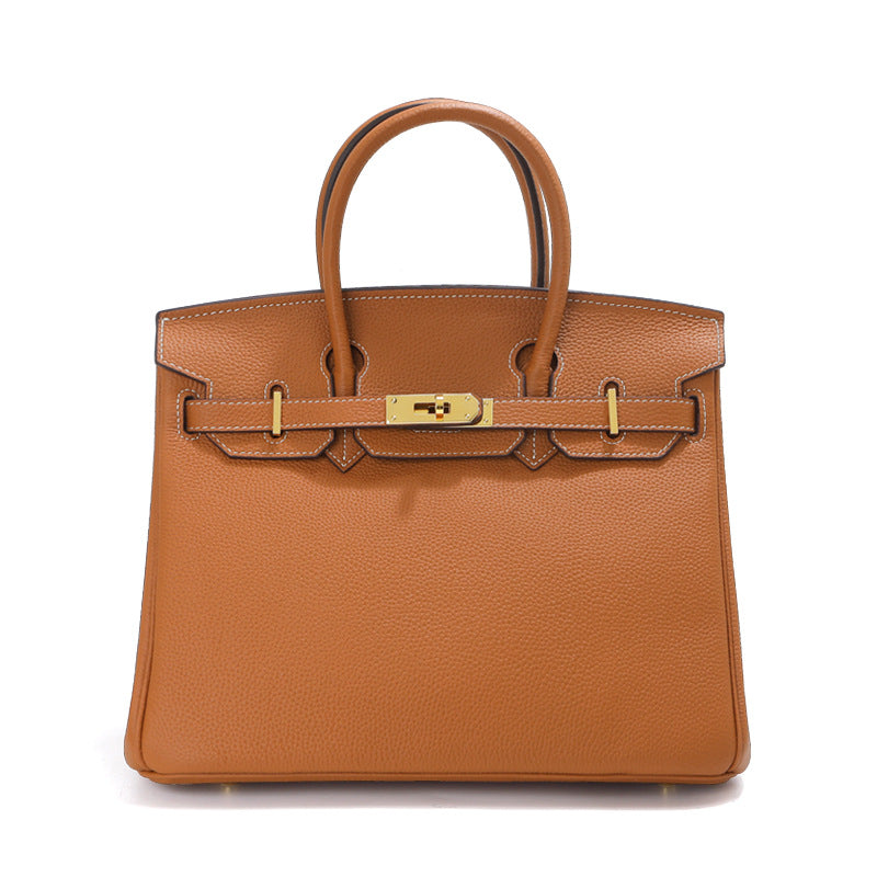 Birk-Handtasche aus Togo-Narbenleder mit goldenen Beschlägen und Drehverschluss