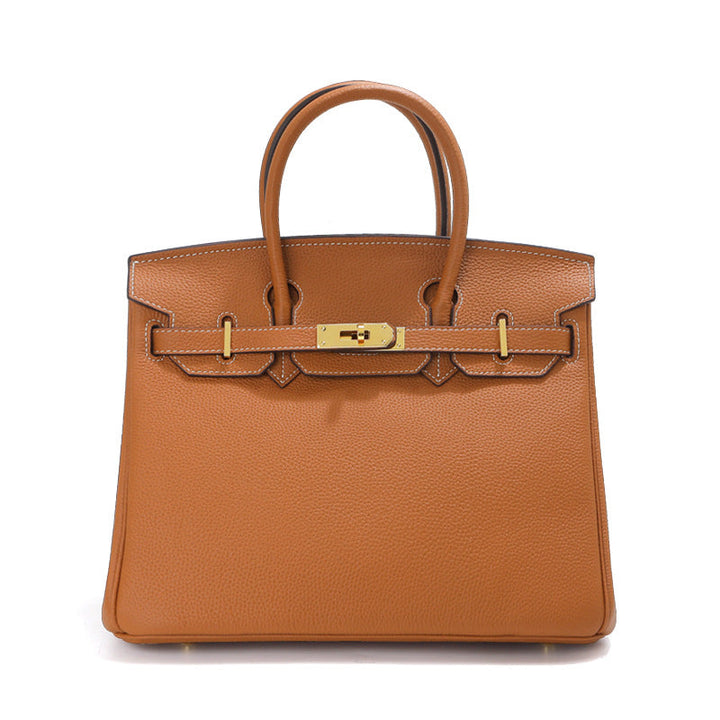 Birk-Handtasche aus Togo-Narbenleder mit goldenen Beschlägen und Drehverschluss