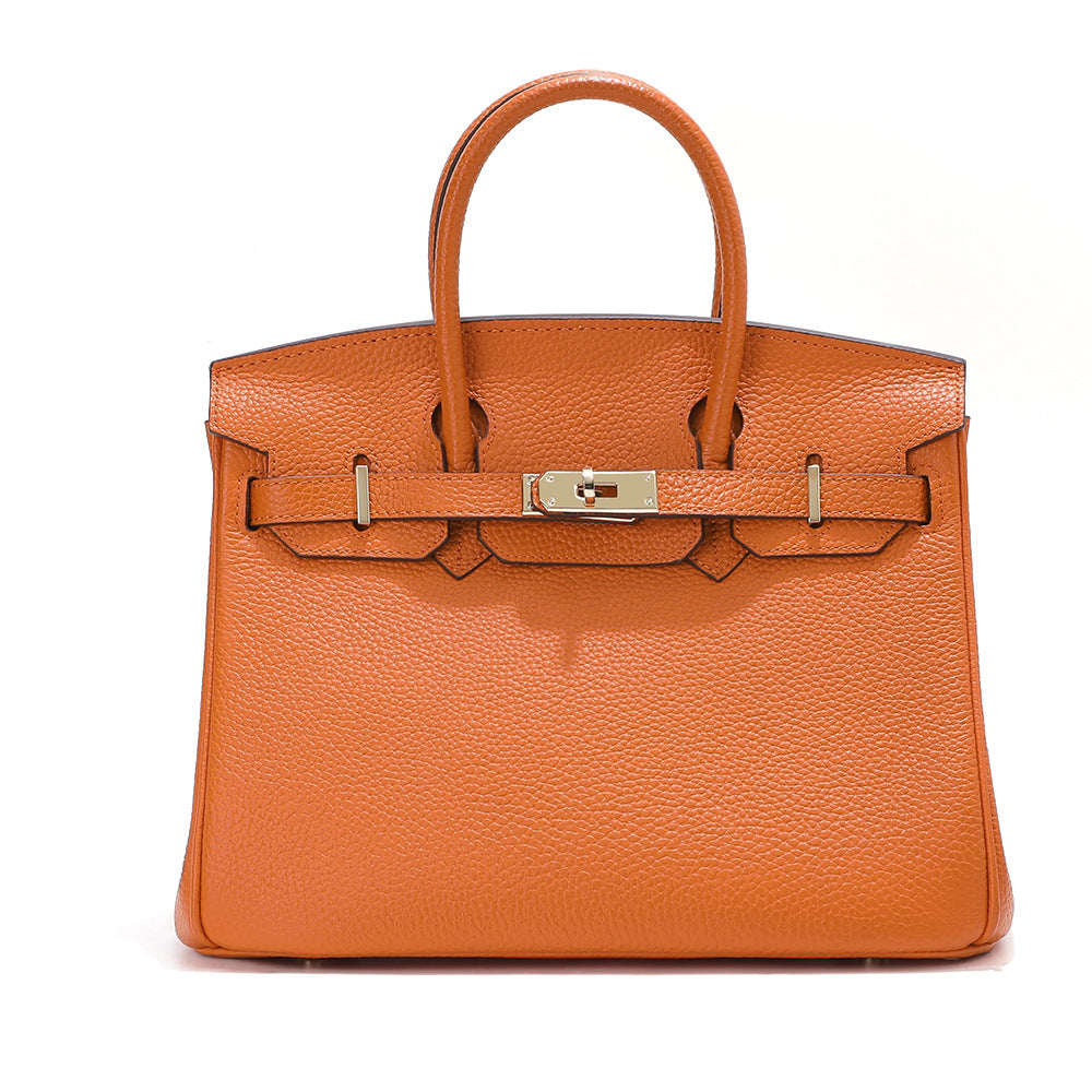 Birk-Handtasche aus Togo-Narbenleder mit goldenen Beschlägen und Drehverschluss