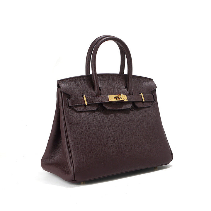 Birk-Handtasche aus Narbenleder mit goldenen Beschlägen