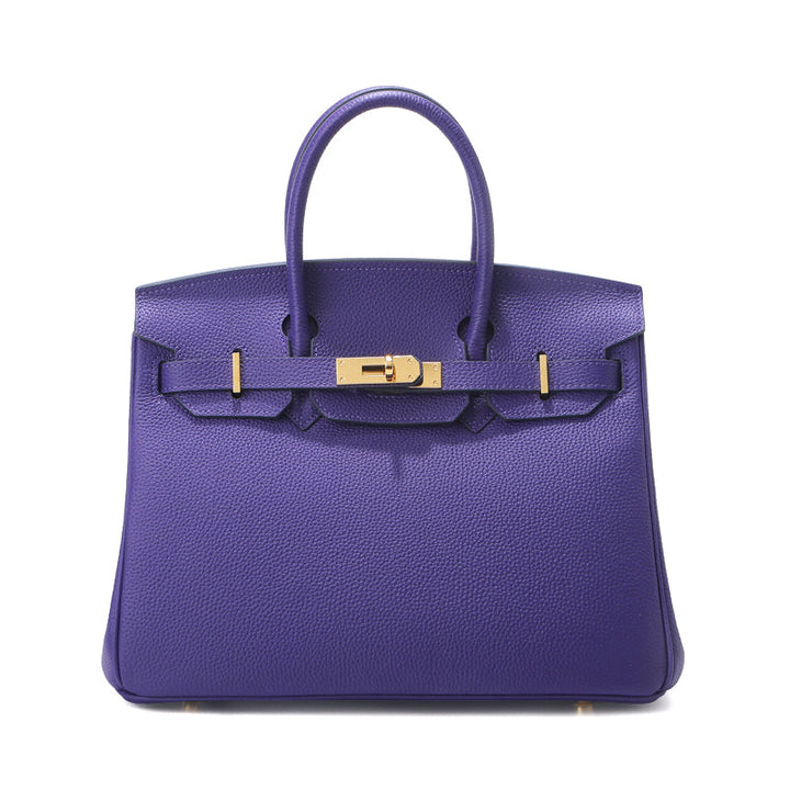 Birk-Handtasche aus Narbenleder mit goldenen Beschlägen