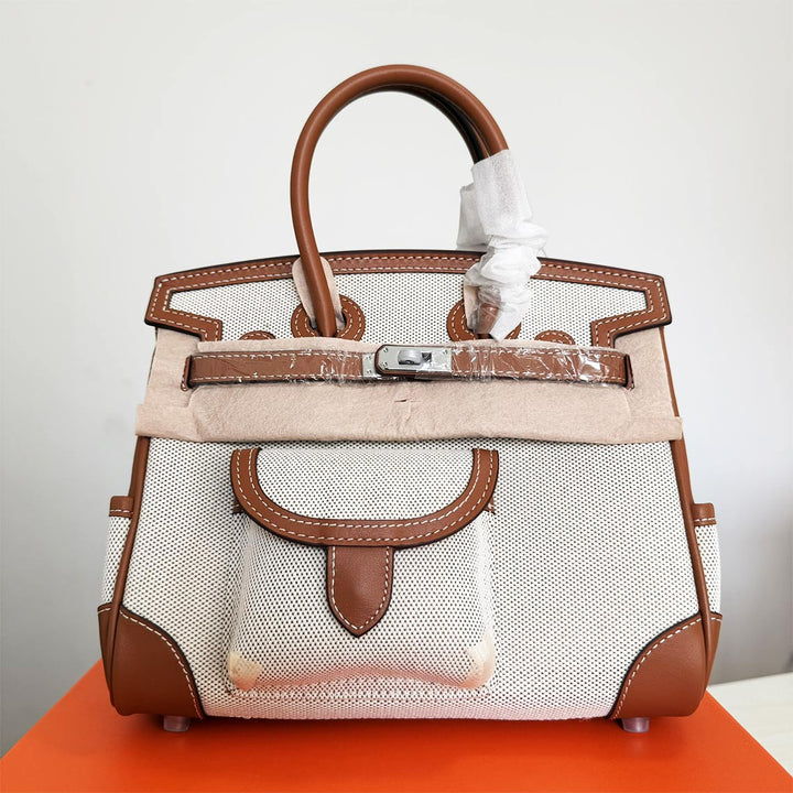 Pocket Birk-Handtasche aus Canvas und Narbenleder mit Seitenfächern und abnehmbarem Riemen