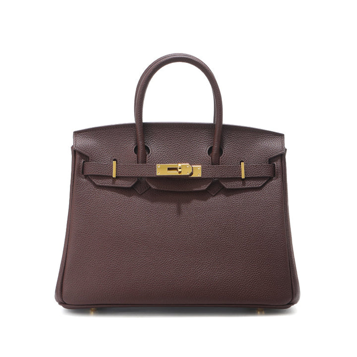 Birk-Handtasche aus Narbenleder mit goldenen Beschlägen