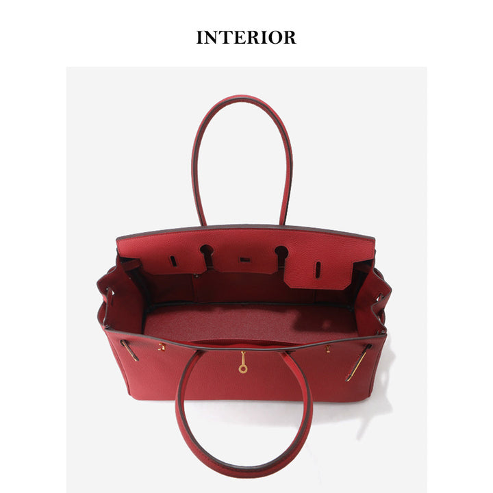 Birk-Schultertasche aus Narbenleder mit Henkeln und goldenen Beschlägen