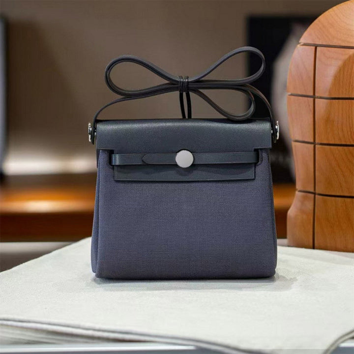 Mini Herbag Schultertasche aus Leder und Canvas mit silberfarbenen Beschlägen