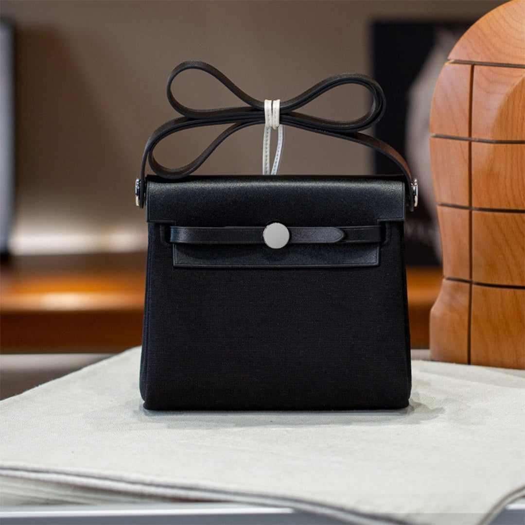 Mini Herbag Schultertasche aus Leder und Canvas mit silberfarbenen Beschlägen