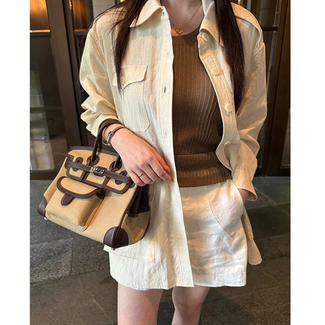 Pocket Birk-Handtasche aus Canvas und Narbenleder mit Seitenfächern und abnehmbarem Riemen