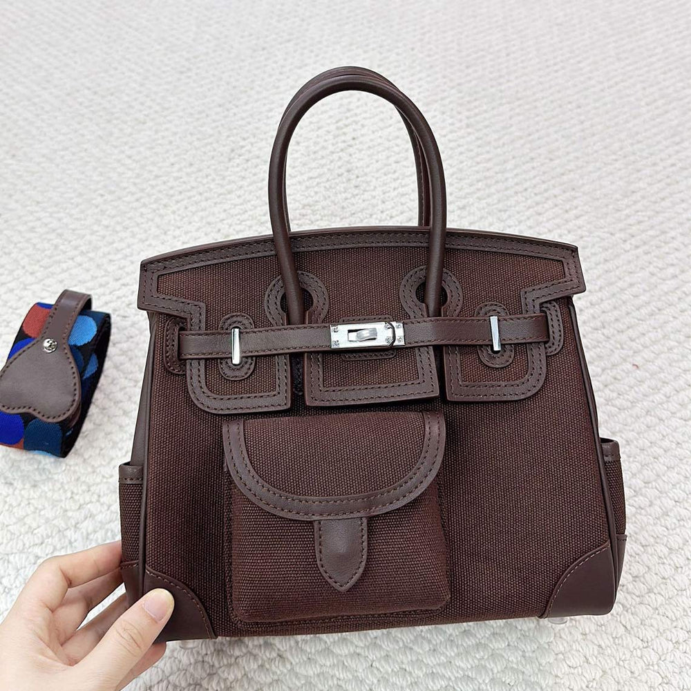 Pocket Birk-Handtasche aus Canvas und Narbenleder mit Seitenfächern und abnehmbarem Riemen