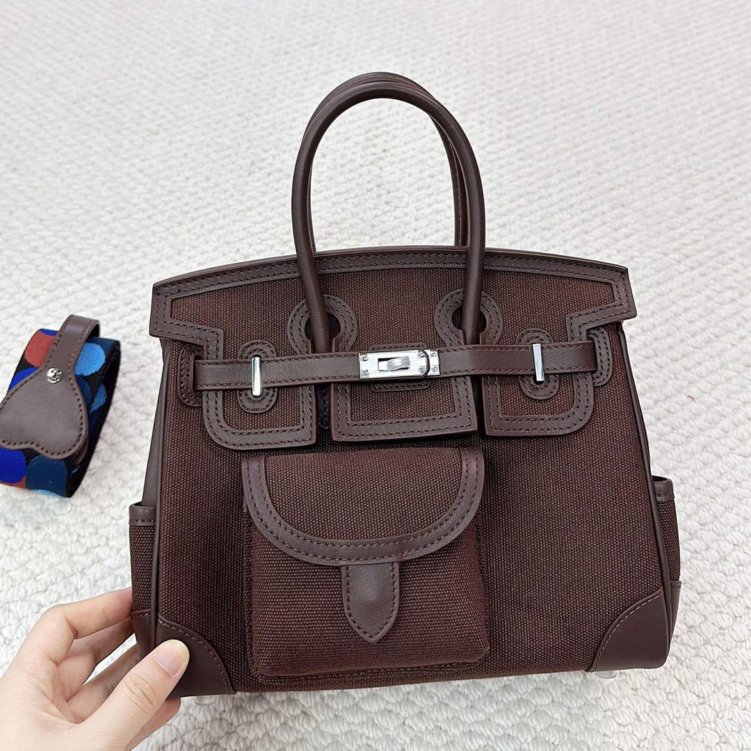 Pocket Birk-Handtasche aus Canvas und Narbenleder mit Seitenfächern und abnehmbarem Riemen