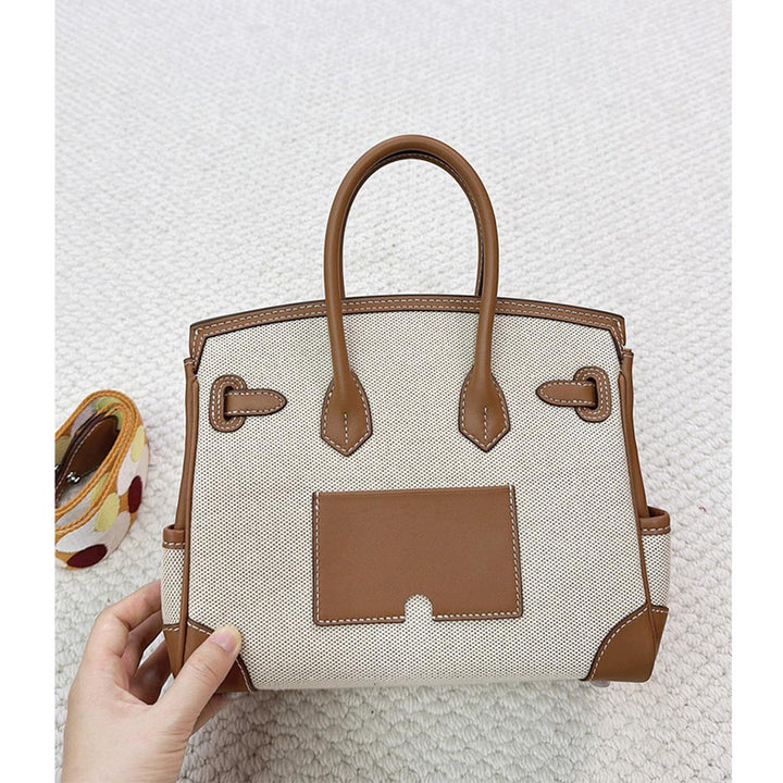 Pocket Birk-Handtasche aus Canvas und Narbenleder mit Seitenfächern und abnehmbarem Riemen
