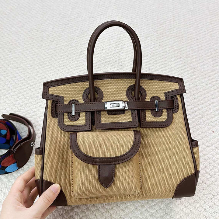 Pocket Birk-Handtasche aus Canvas und Narbenleder mit Seitenfächern und abnehmbarem Riemen
