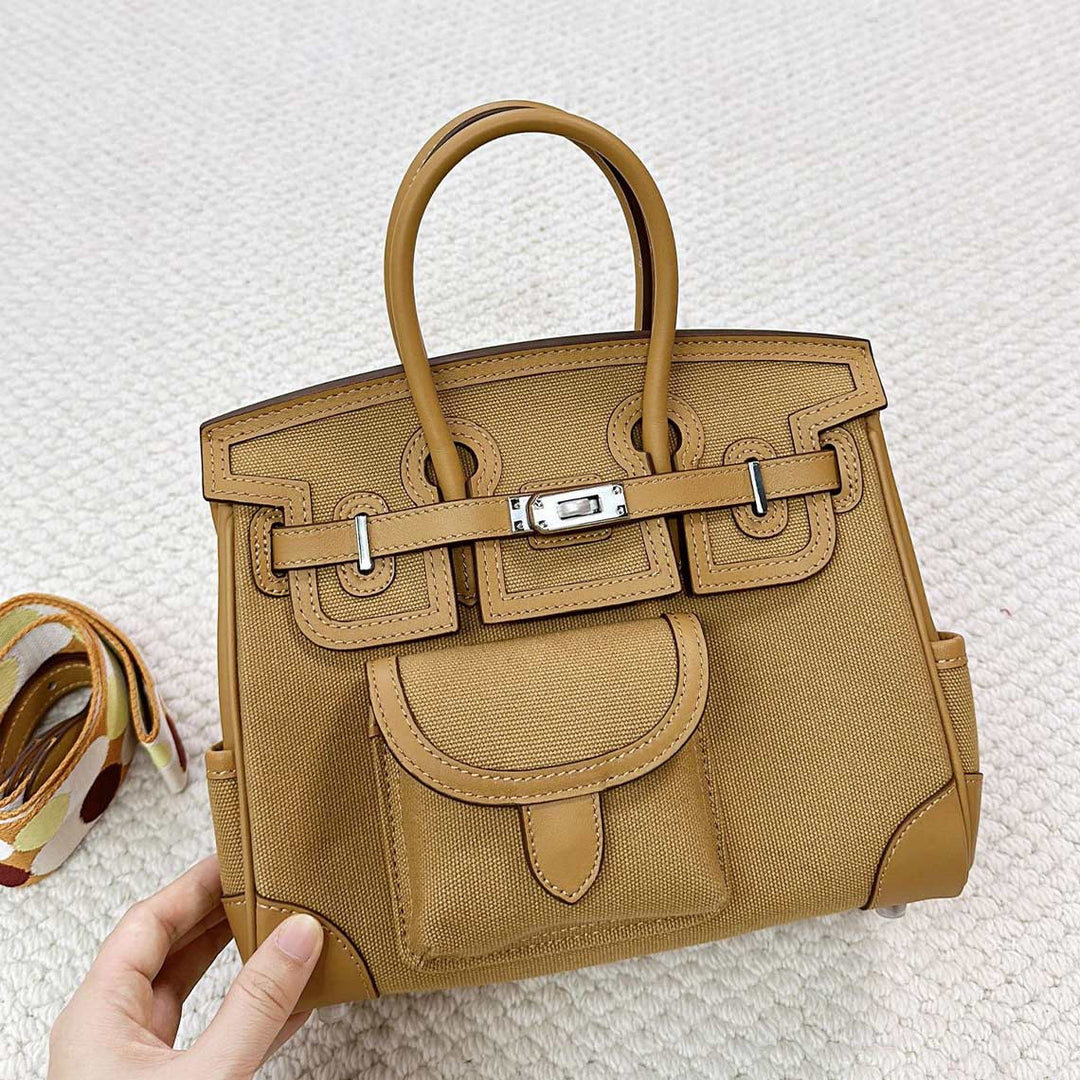 Pocket Birk-Handtasche aus Canvas und Narbenleder mit Seitenfächern und abnehmbarem Riemen