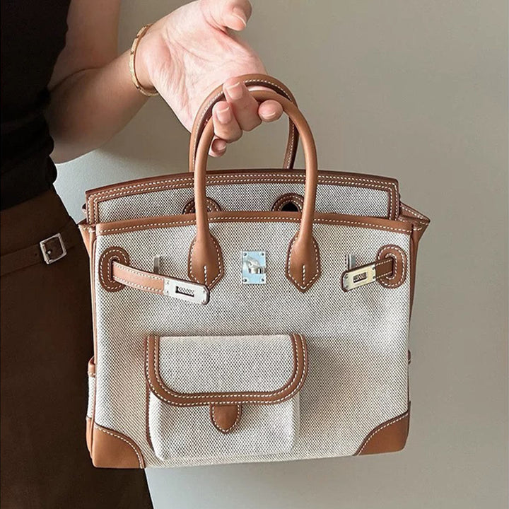 Pocket Birk-Handtasche aus Canvas und Narbenleder mit Seitenfächern und abnehmbarem Riemen