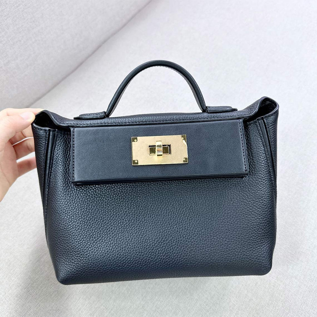 Wings-Handtasche aus genarbtem Narbenleder mit goldfarbenen Beschlägen
