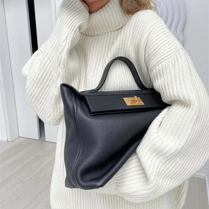 Wings-Handtasche aus genarbtem Narbenleder mit goldfarbenen Beschlägen