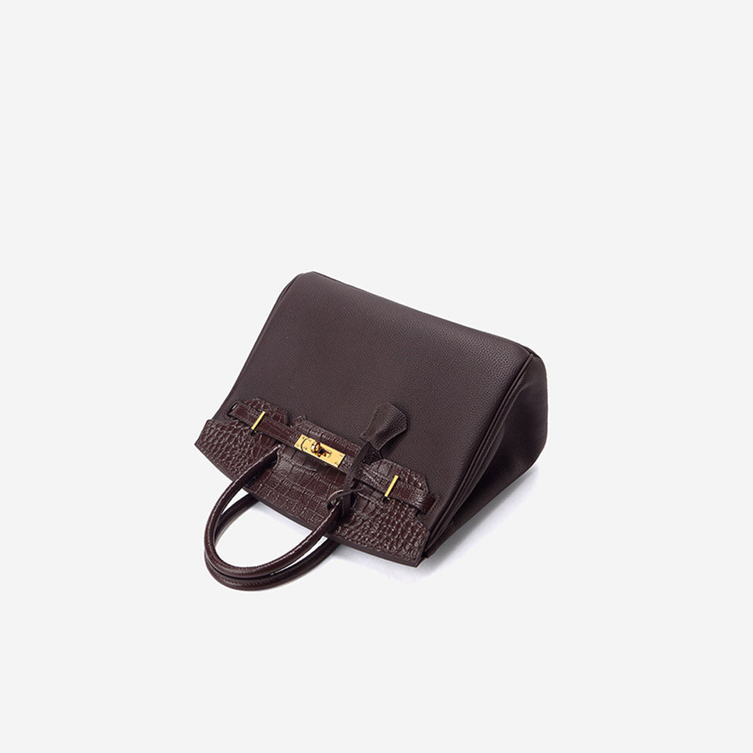 New Birk-Handtasche aus Narbenleder mit Kroko-Klappe und goldfarbenem Drehverschluss