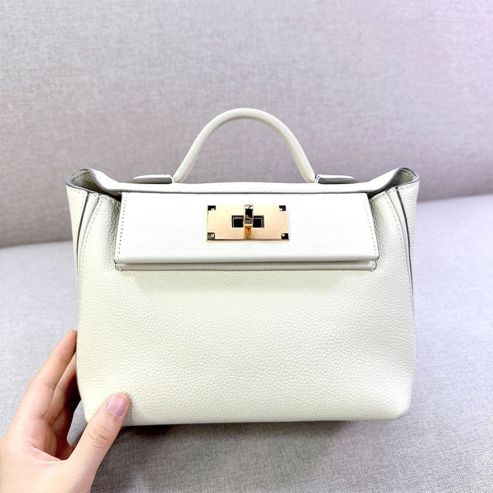 Wings-Handtasche aus genarbtem Narbenleder mit goldfarbenen Beschlägen