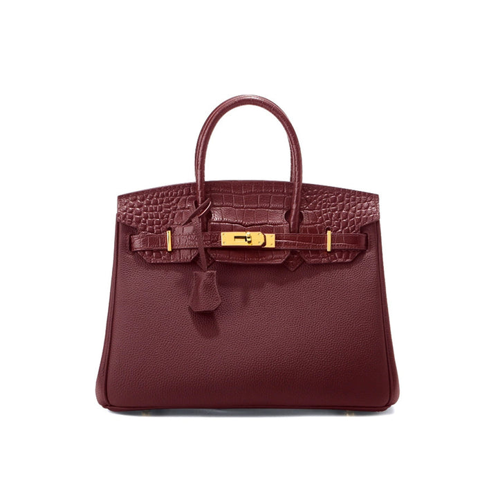 New Birk-Handtasche aus Narbenleder mit Kroko-Klappe und goldfarbenem Drehverschluss