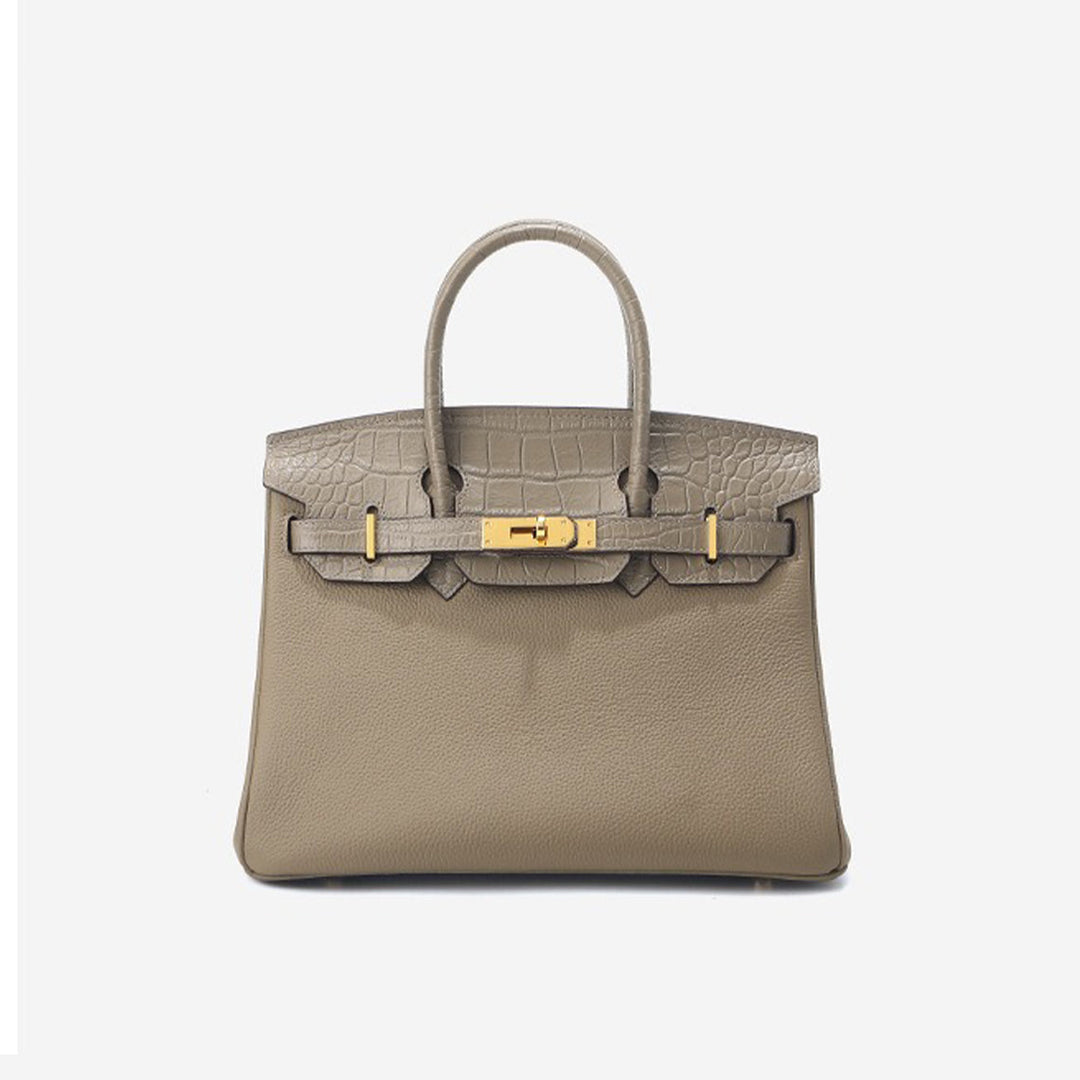 New Birk-Handtasche aus Narbenleder mit Kroko-Klappe und goldfarbenem Drehverschluss