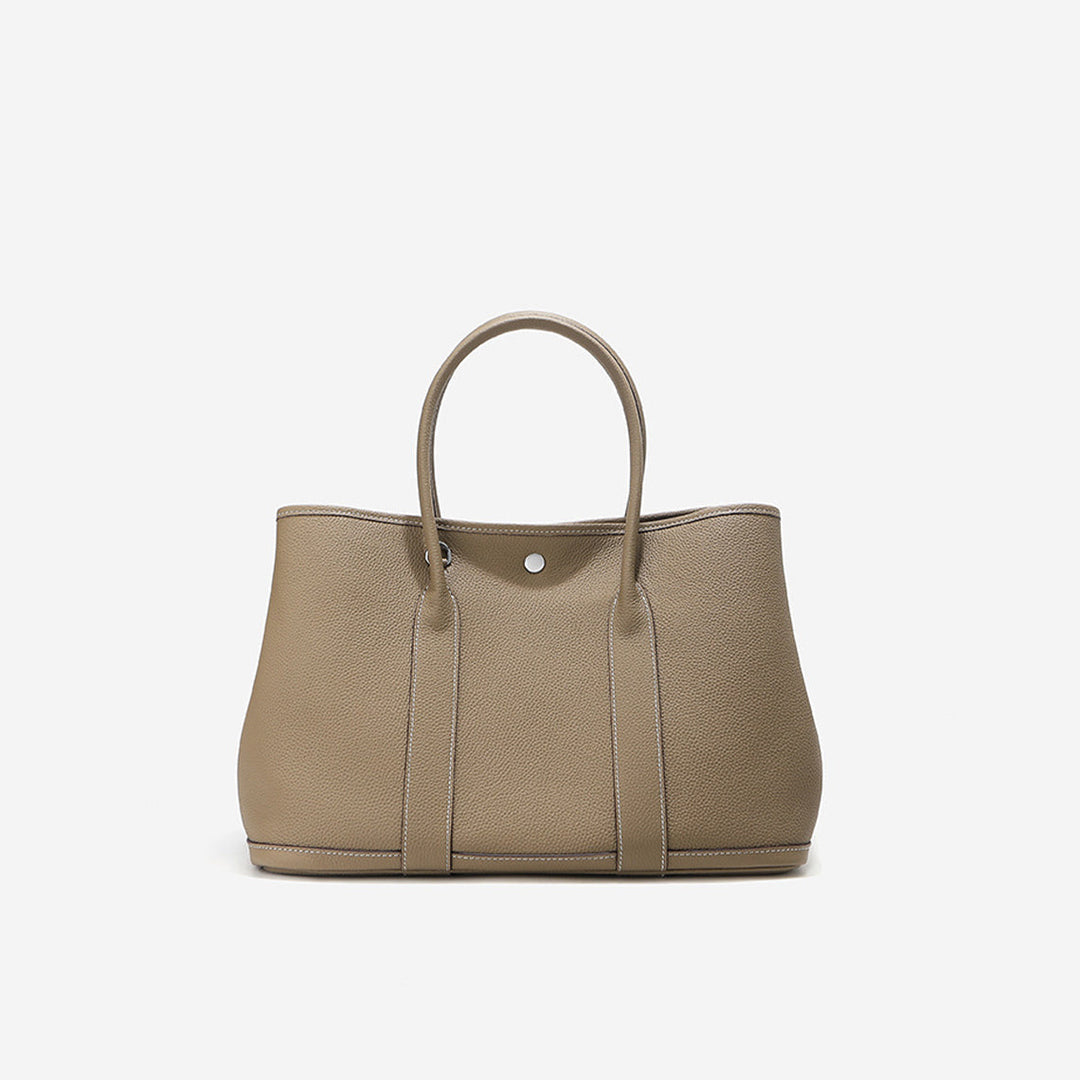 Garden-Handtasche aus Narbenleder mit gerollten Henkeln und Druckknopf