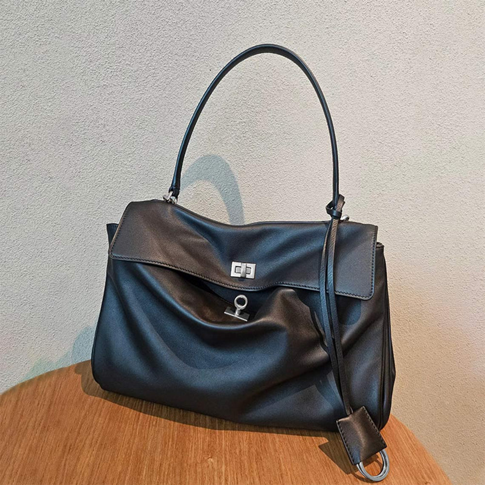 Rodeo Schultertasche aus Narbenleder mit Henkel und Riemen
