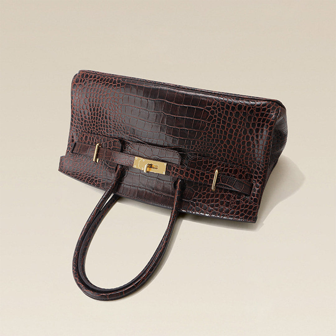 Birk Schultertasche aus Leder mit Kroko-Prägung und goldenen Beschlägen