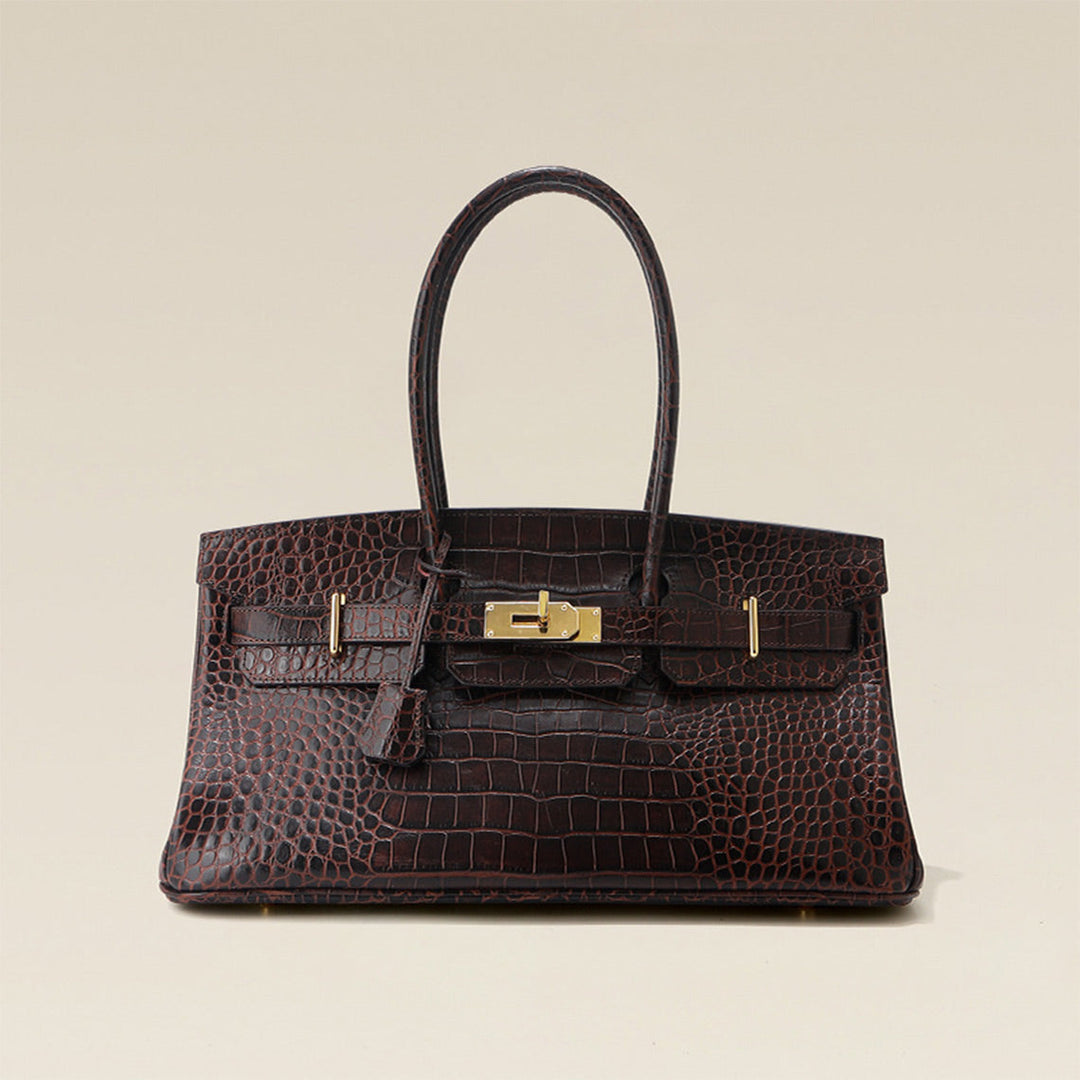 Birk Schultertasche aus Leder mit Kroko-Prägung und goldenen Beschlägen