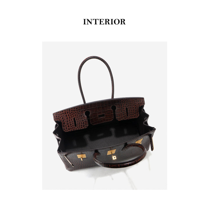 Birk Schultertasche aus Leder mit Kroko-Prägung und goldenen Beschlägen
