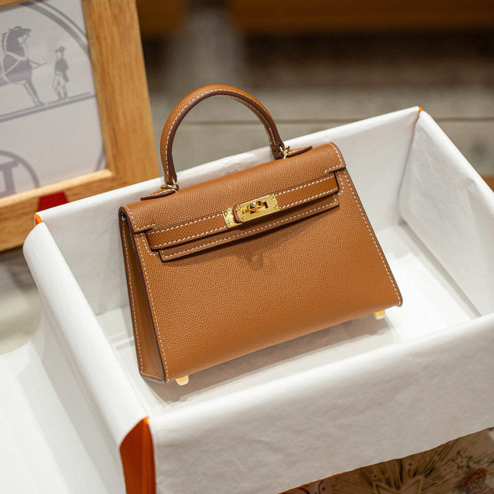 Mini Kelli 19-Handtasche aus Narbenleder mit Henkel und abnehmbarem Schulterriemen
