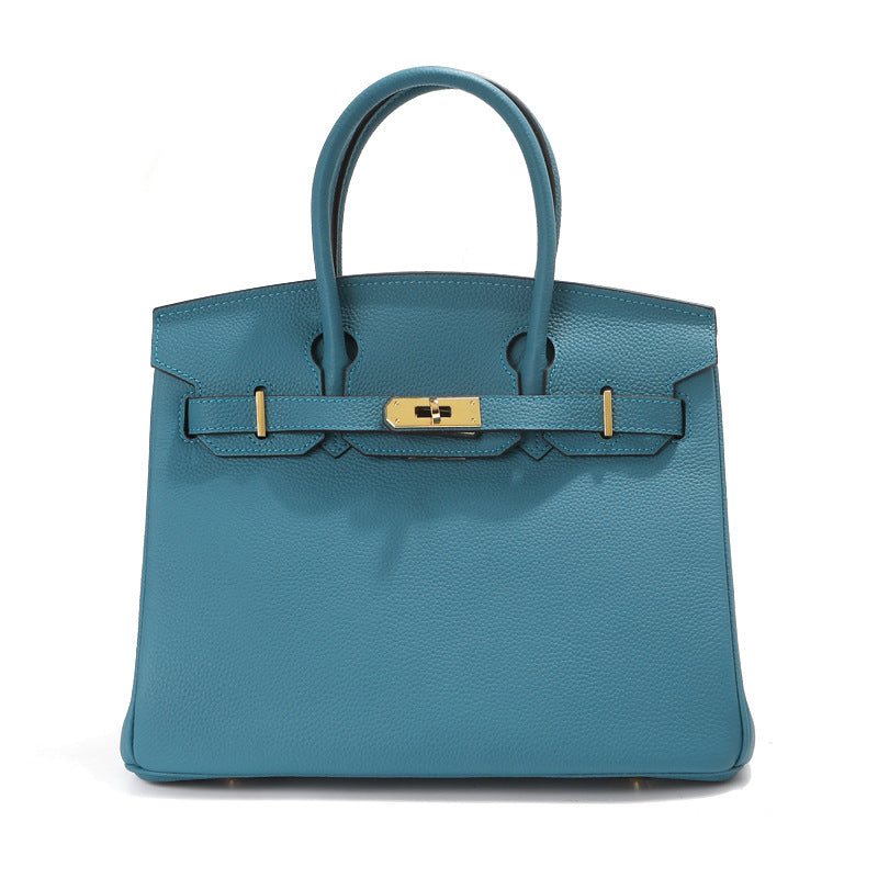 Birk-Handtasche aus Narbenleder mit goldenen Beschlägen