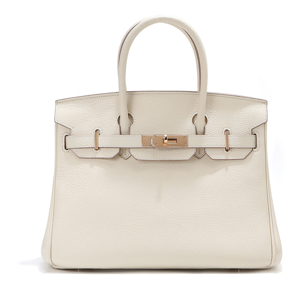 Birk-Handtasche aus Togo-Narbenleder mit goldenen Beschlägen und Drehverschluss