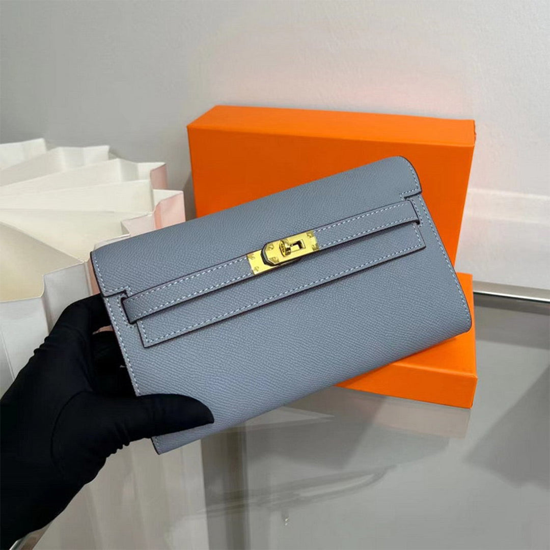 Lange Kelly Geldbörse aus Leder mit Klappenschloss und Umhängeriemen