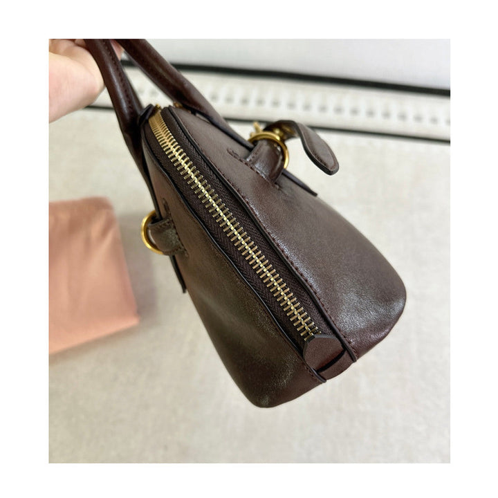Retro Bowling-Tasche aus Leder mit Henkel und goldfarbenen Beschlägen