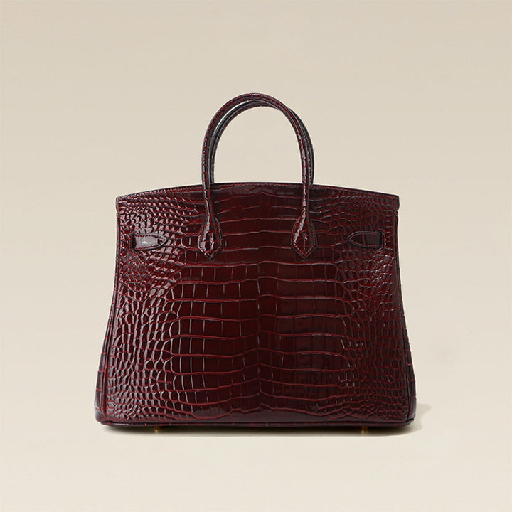 Birk-Handtasche aus Leder mit Kroko-Prägung in Rouge mit goldenem Drehverschluss