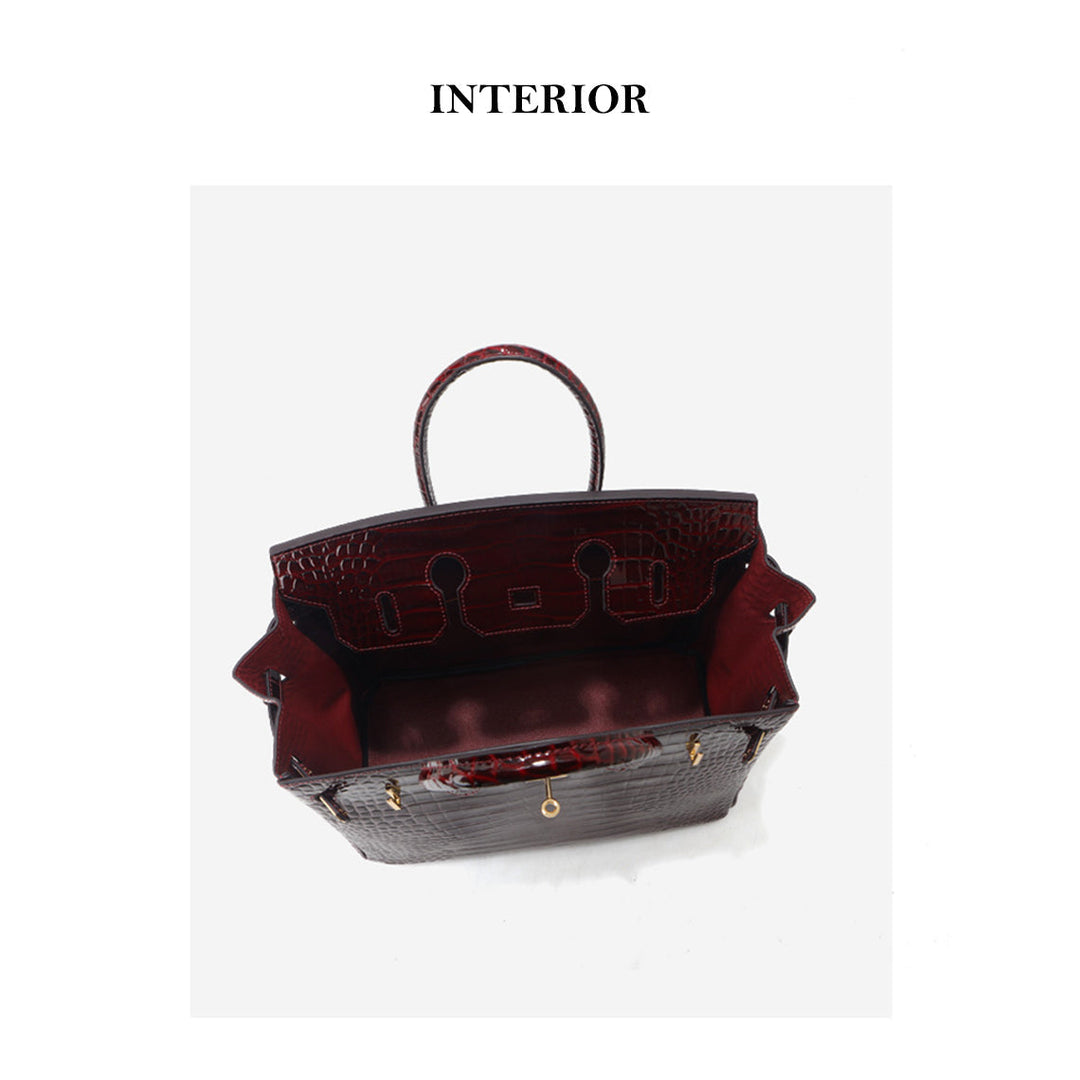 Birk-Handtasche aus Leder mit Kroko-Prägung in Rouge mit goldenem Drehverschluss