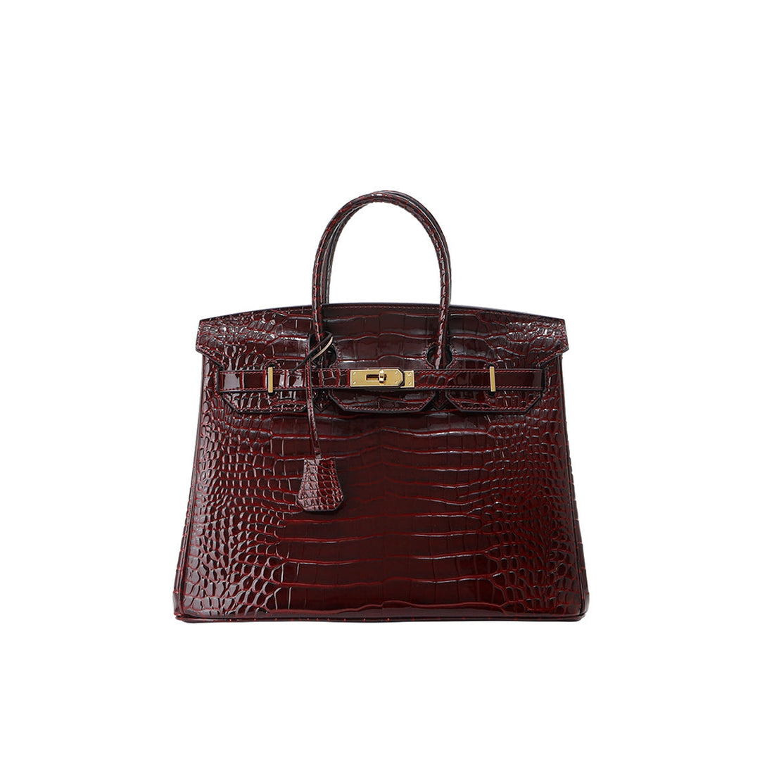 Birk-Handtasche aus Leder mit Kroko-Prägung in Rouge mit goldenem Drehverschluss
