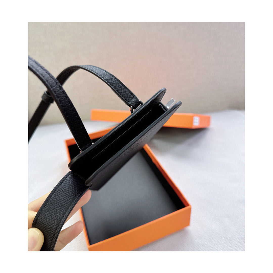 Handytasche aus Leder mit Drehverschluss und Schulterriemen