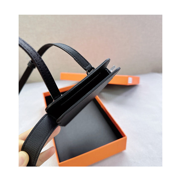Handytasche aus Leder mit Drehverschluss und Schulterriemen