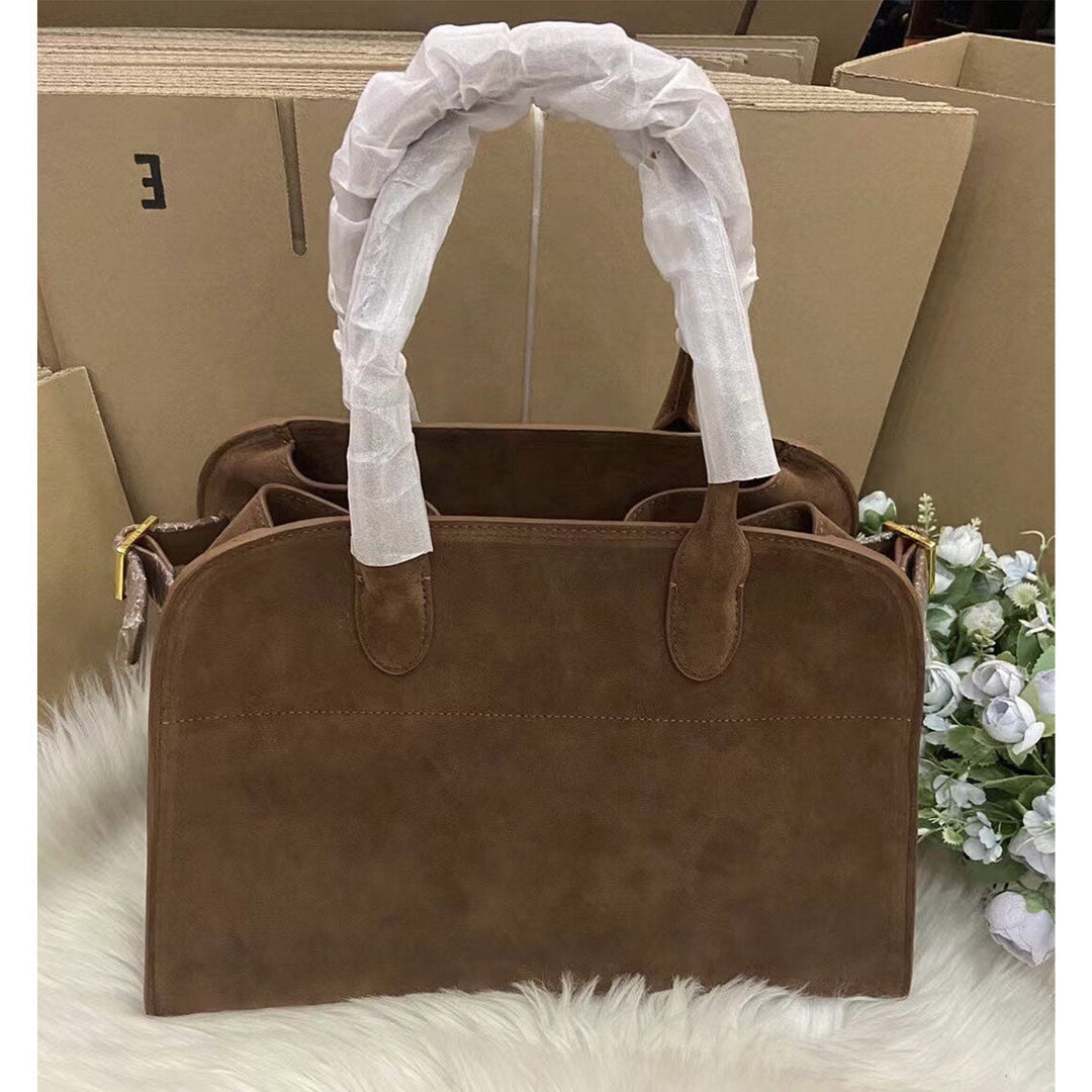Margo Handtasche aus Wildleder mit Henkeln und goldfarbenen Beschlägen