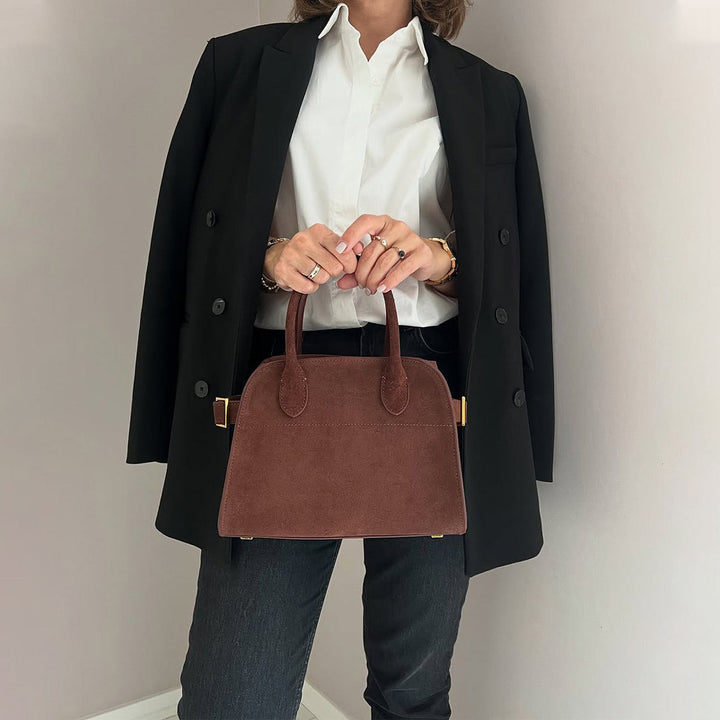 Margo Handtasche aus Wildleder mit Henkeln und goldfarbenen Beschlägen