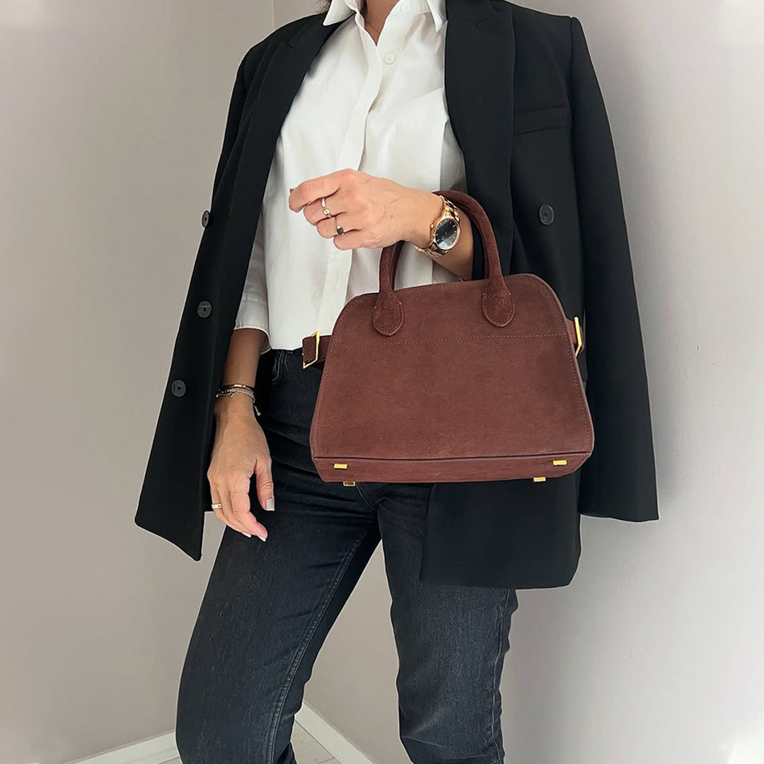 Margo Handtasche aus Wildleder mit Henkeln und goldfarbenen Beschlägen
