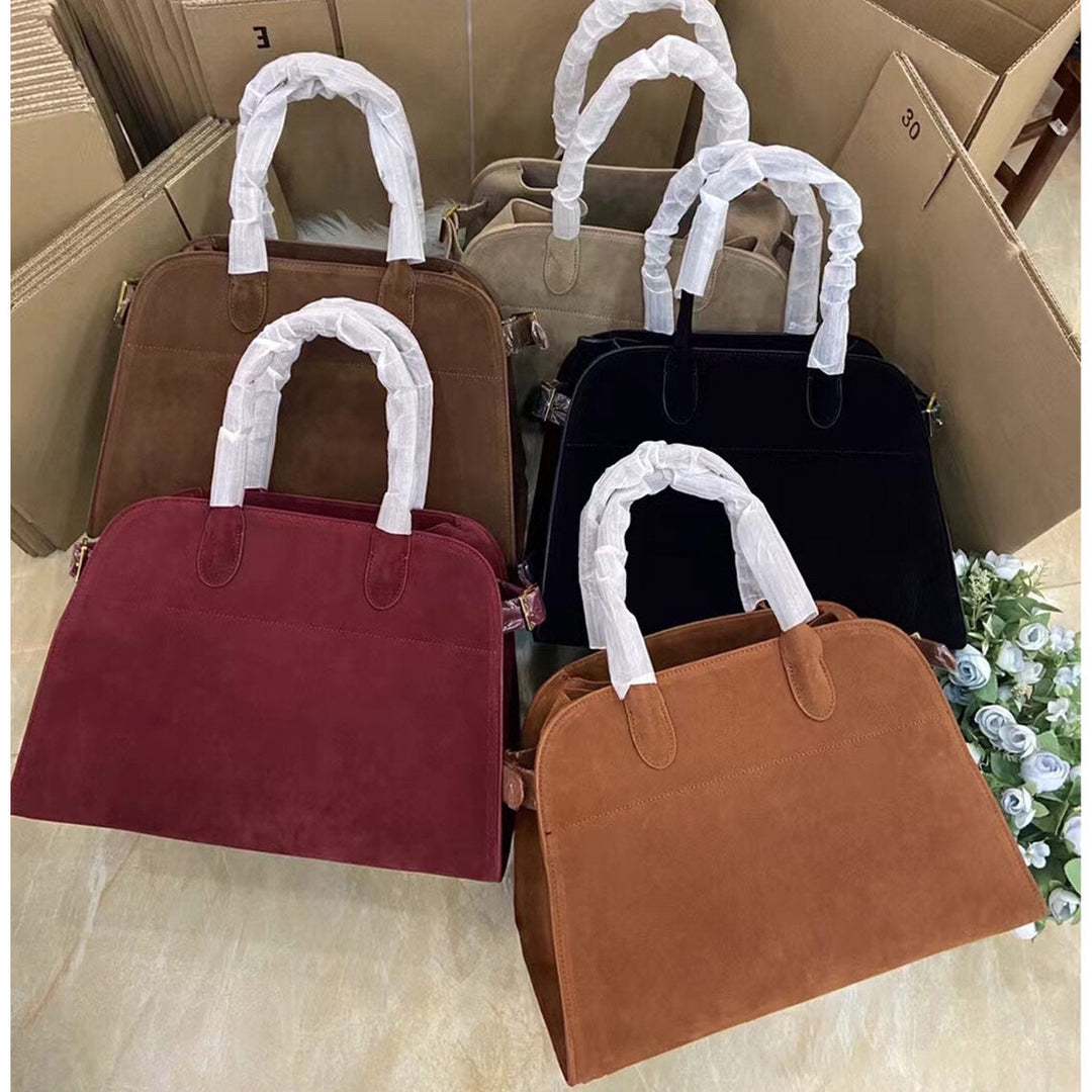 Margo Handtasche aus Wildleder mit Henkeln und goldfarbenen Beschlägen